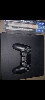 PS4 slim avec 2 manettes et 3 jeux inclus