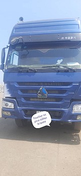 Camion Sinotruck en excellent état avec système de géolocalisation