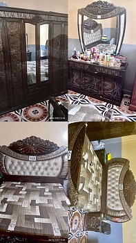 Chambre à coucher avec lit et armoire en excellent état