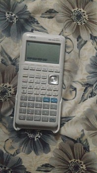 Calculatrice graphique presque neuve, prix négociable