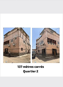 Maison R+2 avec 10 chambres et terrasse à vendre