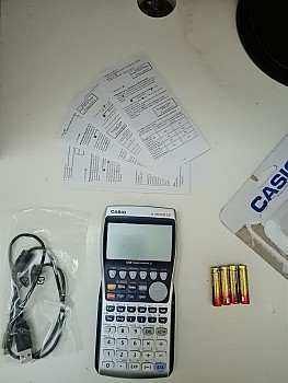 Calculatrice avec ses batteries originales