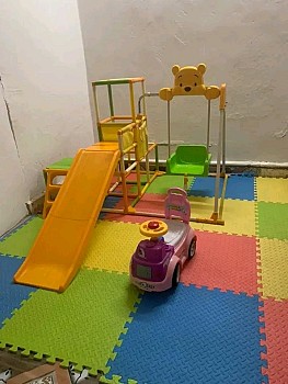 Aire de jeux avec tapis