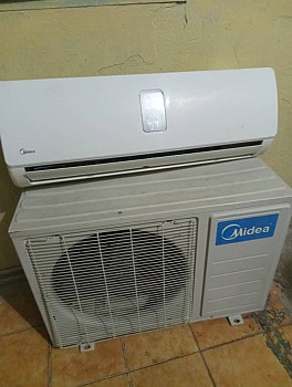 Climatiseur Midea 1,5 CV - Excellent état, prix attractif