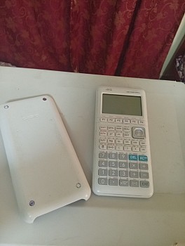 Calculatrice graphique en bon état, fonctionnelle