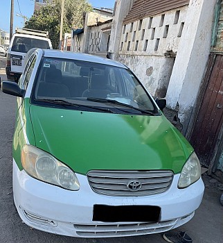 Taxi Marque Toyota Corolla CE 2003