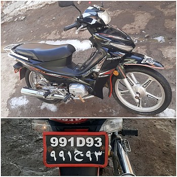 Moto Jincheng 110 noire, immatriculée 991D93