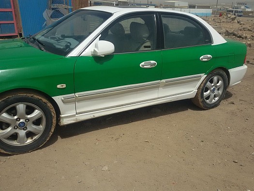 Kia optima climatisé