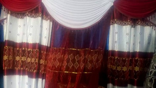 rideau" Qurba Joog"