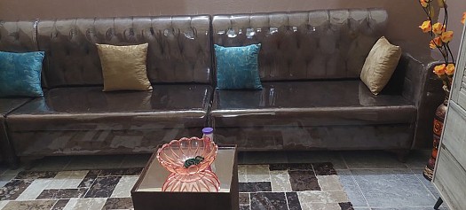 Salon en forme de L avec son tapis