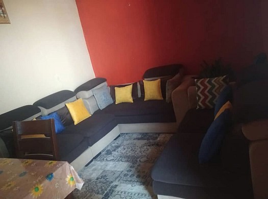 Salon en forme L tout neuf en très bon état