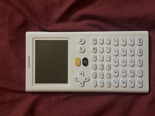 Calculatrice graphique NumWorks, presque neuve, rechargeable
