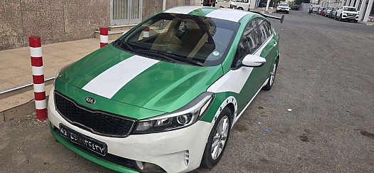 Taxi Kia K3 2016 avec climatisation en parfait état