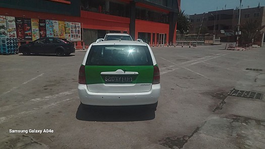 Taxi Toyota Corolla climatisé en excellent état