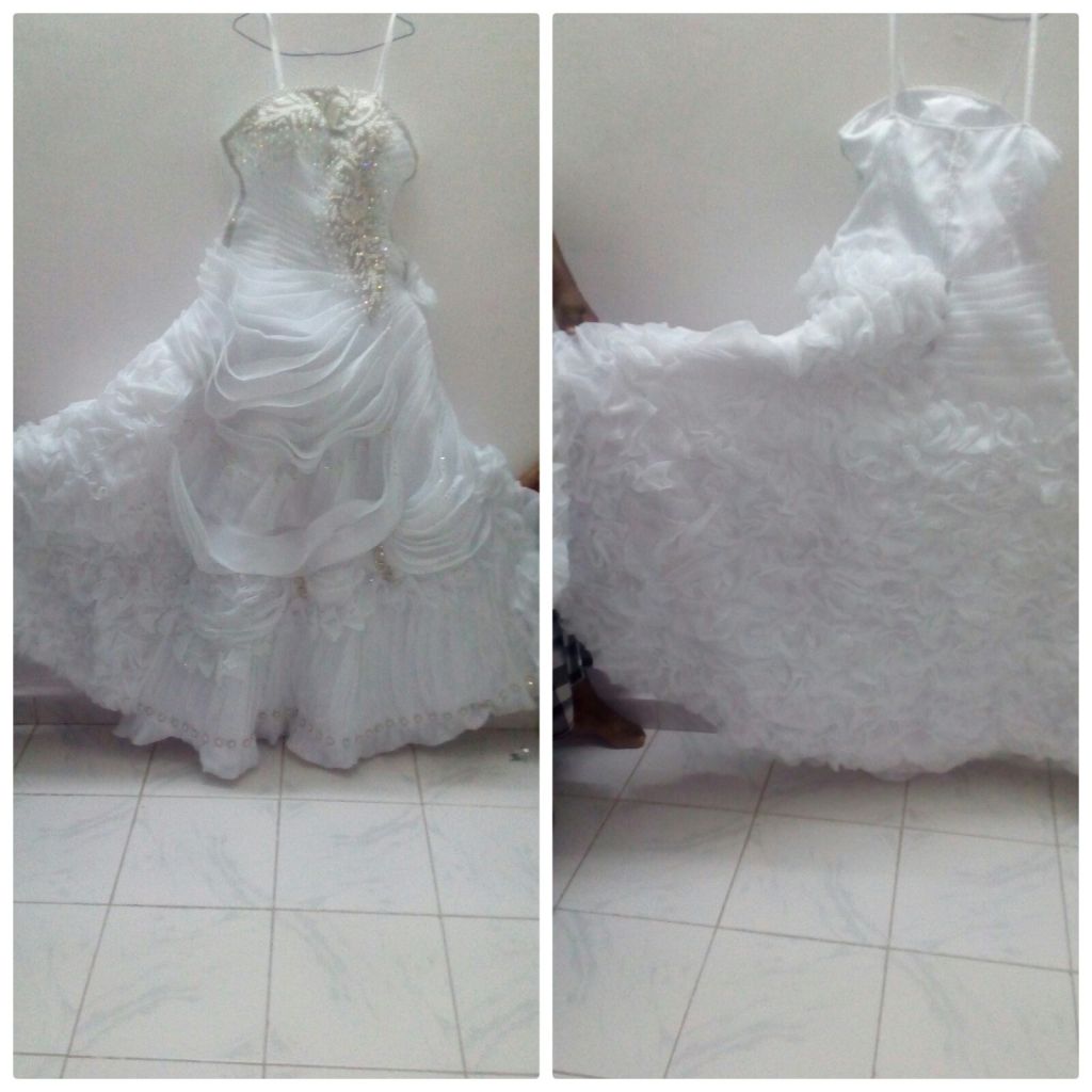 Je vend une belle robe blanche